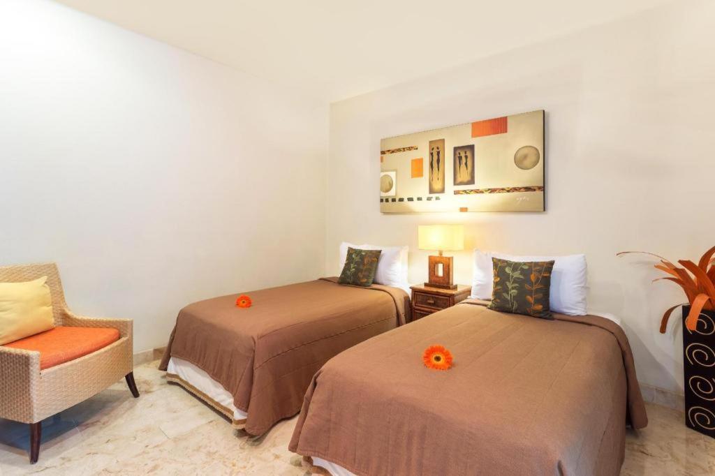 Maya Villa Condo Hotel プレヤデルカーメン エクステリア 写真